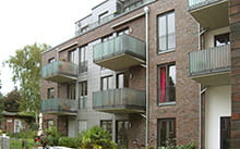 Details Hinterhof mit Fassade Seitenflügel Wohn und Geschäftshaus
